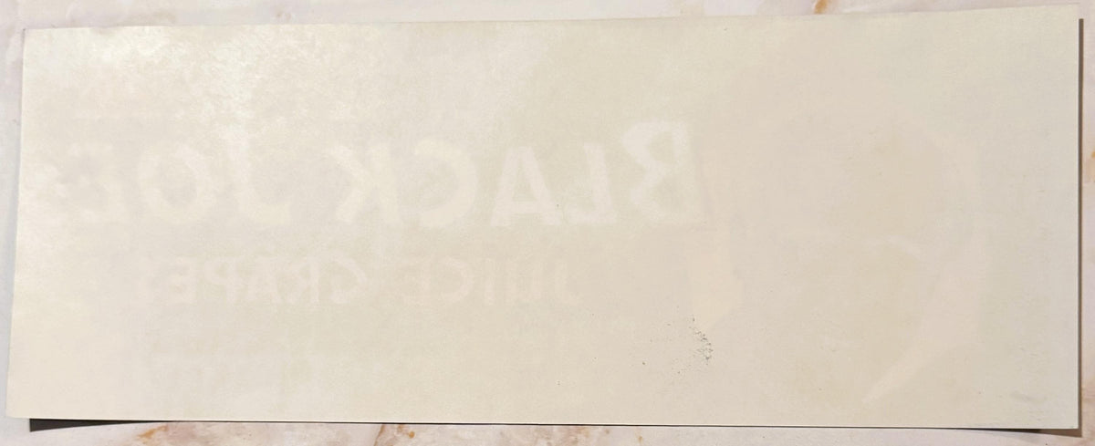 Blank cream-colored vintage fruit crate label with faint watermark text, shown flat against neutral background with dark bord