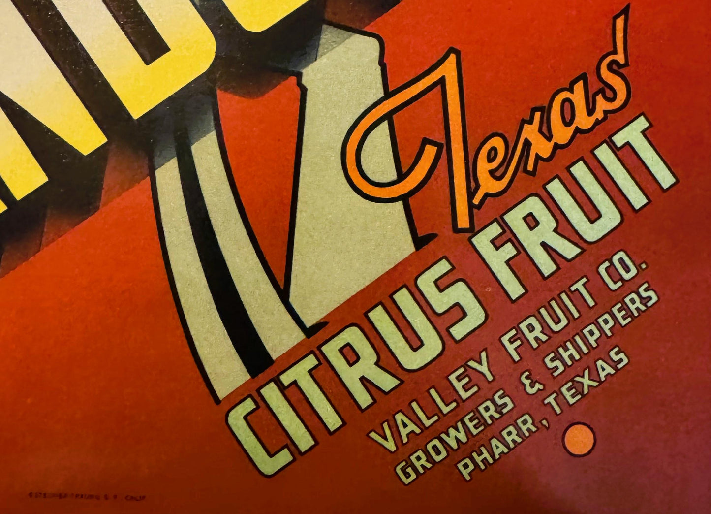 Vintage citrus crate label with orange and cream geometric design, "Citrus Fruit" text in orange, "Valley Fruit Co., Pharr, T