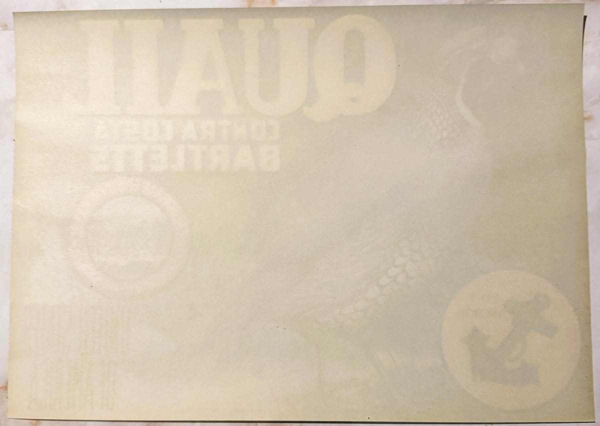Faded cream-colored vintage crate label with embossed "QUAIL" branding and partially visible text, photographed flat against 