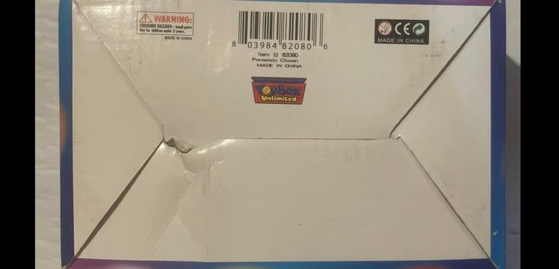 White envelope with purple borders and barcode for Rare 1981 Porcelain Clown Doll