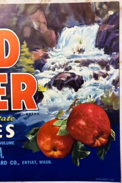 Vintage Mad River Brand apple crate label featuring two red apples with leaves against a waterfall landscape and orange text 