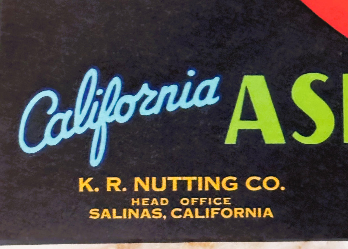 Vintage crate label with "California" in light blue script and "Asparagus" in lime green, K.R. Nutting Co. head office Salina