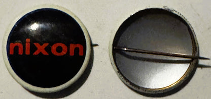 Front and back views of a round campaign button with cream-colored rim, black dome, and red "nixon" text, with metal pin clos