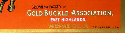 Vintage fruit crate label with orange background, gold band at bottom, showing text for Gold Buckle Association, East Highlan