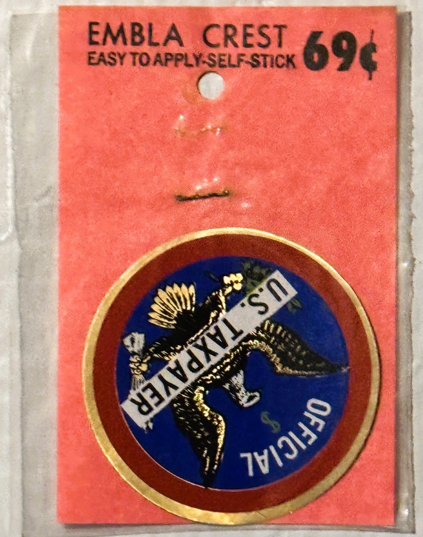 Vintage Embla Crest self-stick decal on coral packaging, priced 69¢, featuring eagle emblem on blue circular background with 