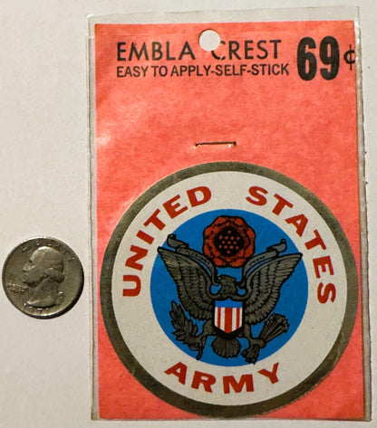 Vintage United States Army self-stick decal on orange packaging priced at 69¢, shown next to a quarter for scale