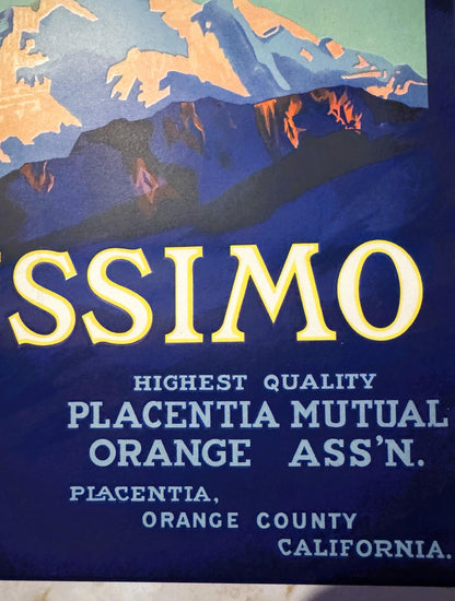 Close-up of the Altissimo crate label's right side: SSIMO in cream letters under the snowy mountains, then Highest Quality, Placentia Mutual Orange Ass'n., Placentia, Orange County, California on navy