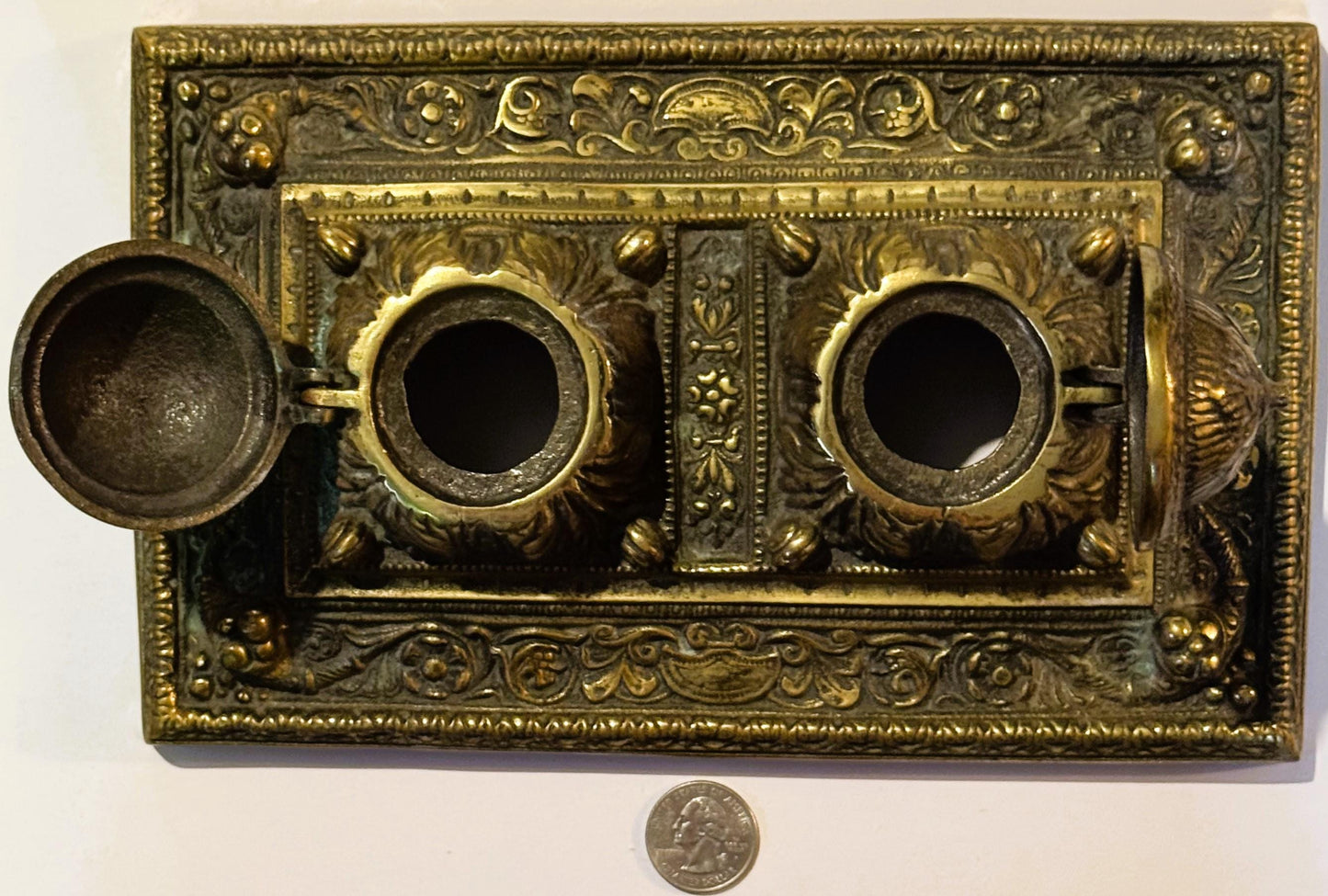 Ornate brass double inkwell as a stunning late 19th century desk accessory