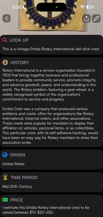 Vintage Embla Rotary International self-stick crest with blue and gold gear wheel emblem on cream background