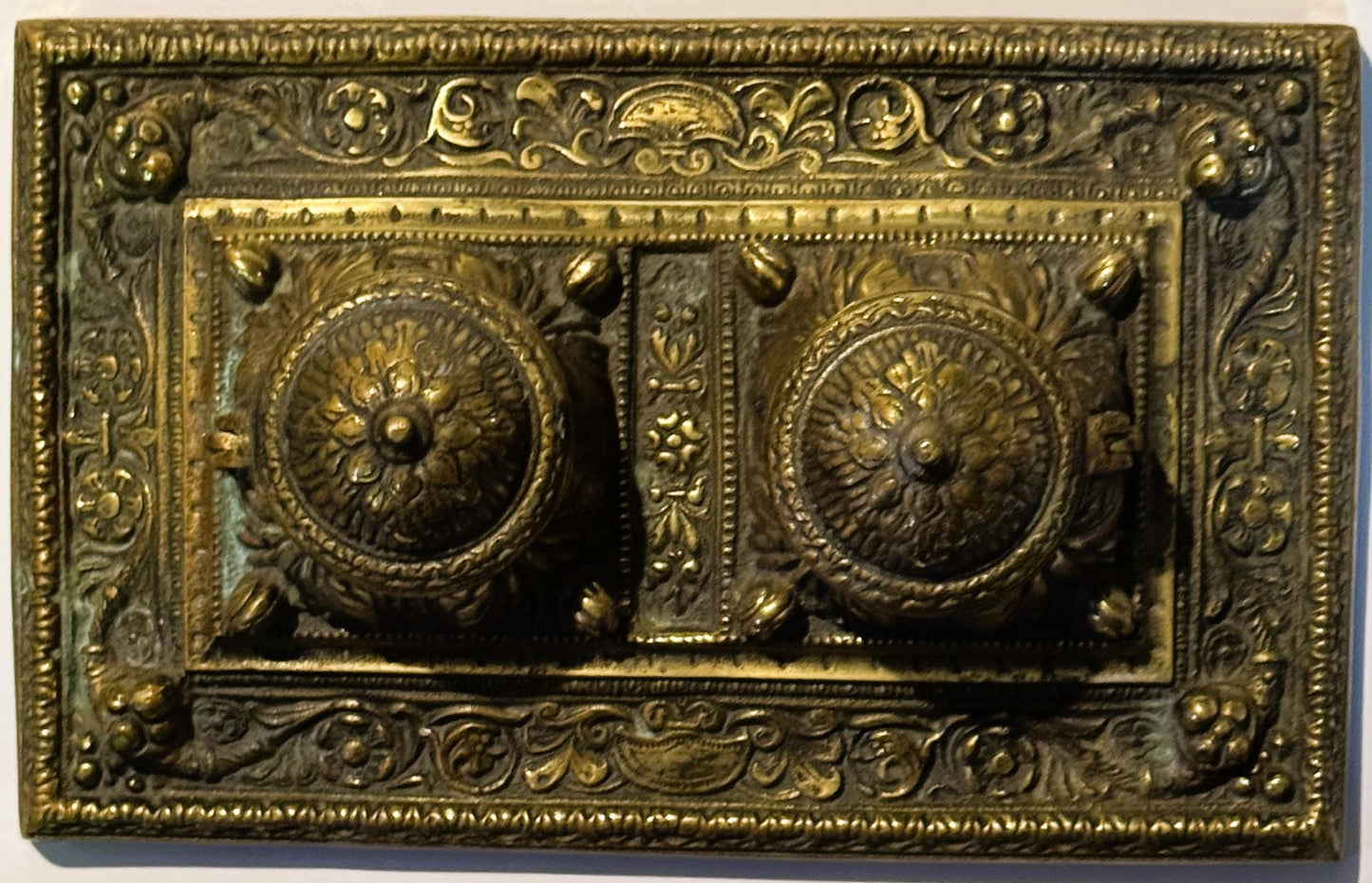 Ornate brass decorative plaque on stunning late 19th century double inkwell desk accessory