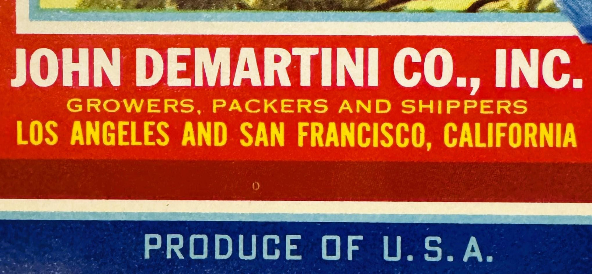 Vintage produce crate label with red, white, and blue stripes reading "John Demartini Co., Inc." and "Los Angeles and San Fra