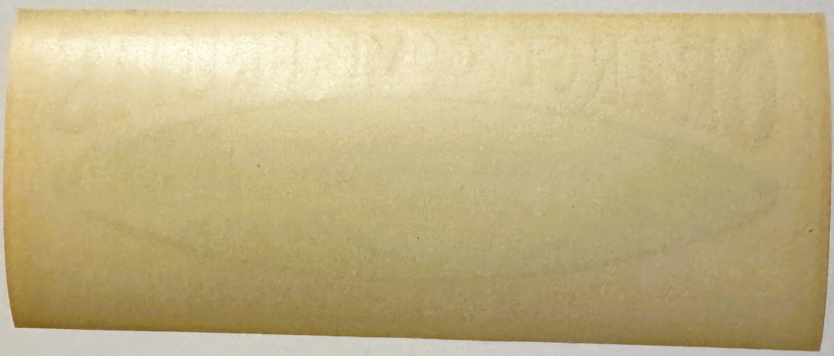 Blank cream-colored vintage crate label photographed flat against white background