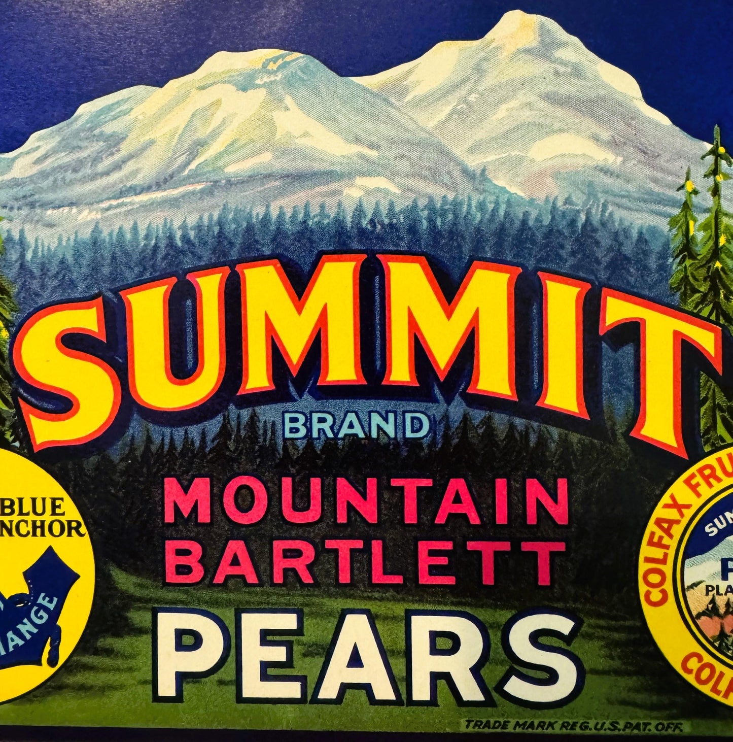Vintage Summit Brand Mountain Bartlett Pears crate label featuring snow-capped mountain, forest, and bold yellow and red text