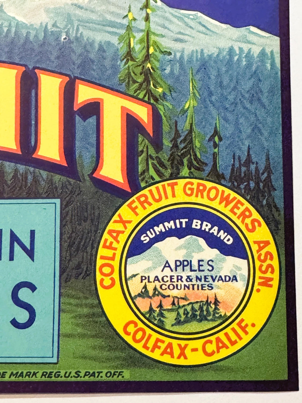 Vintage Summit Brand apple crate label featuring mountain landscape with evergreen trees, yellow circular seal for Colfax Cal
