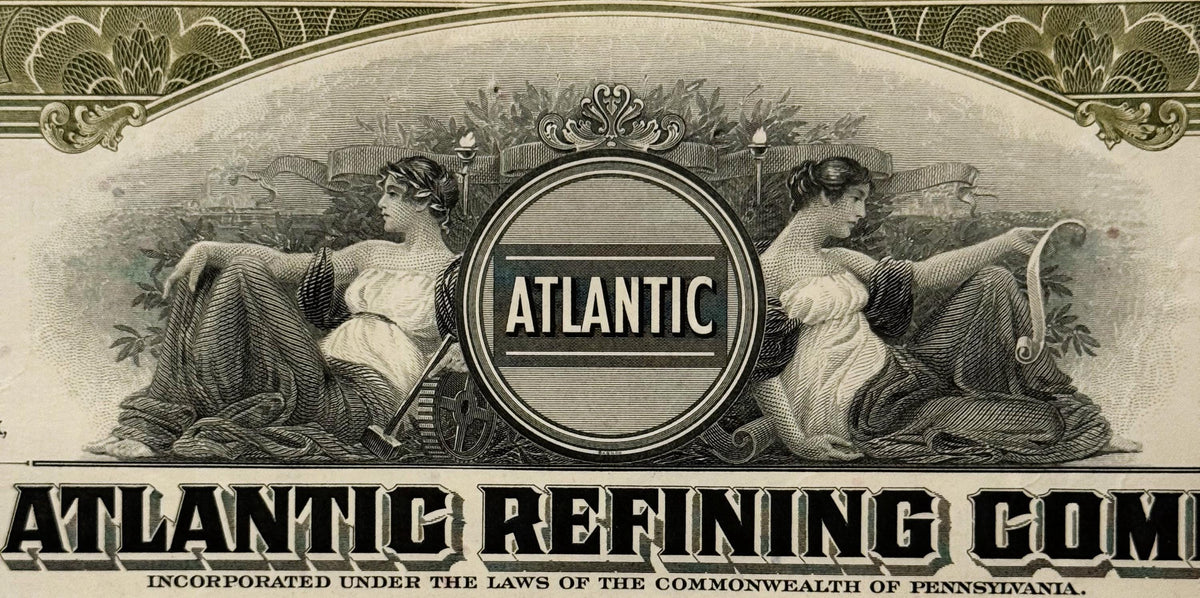 Ornate vintage stock certificate header for Atlantic Refining Company showing two classical female figures flanking a circula