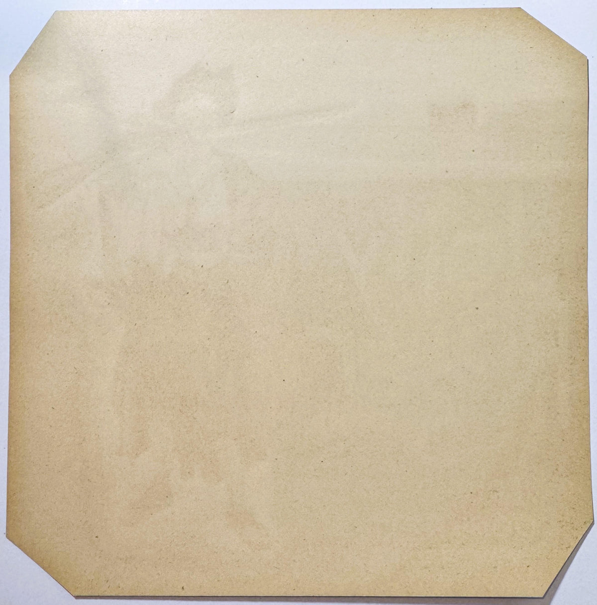 Back of the Jolly Roger crate label: blank paper with clipped corners