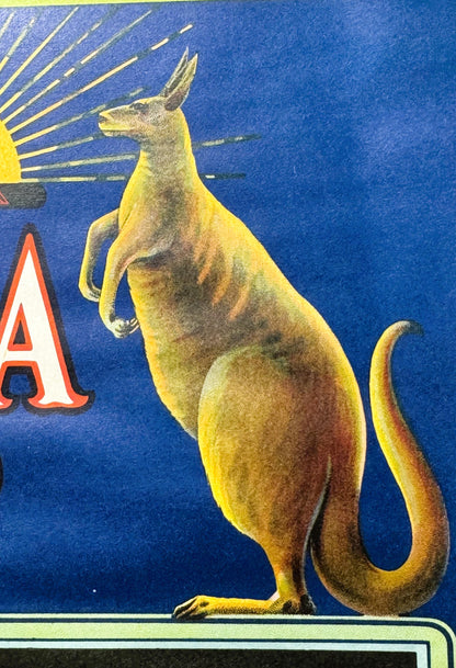 Close-up of the label's upright kangaroo, showing the lithographed detail against the deep blue ground and radiating sunburst.
