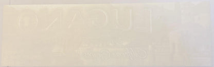 Cream-colored vintage crate label with embossed text reading "Lugano Grapes" and "Fresno, CA," shown at full size against whi