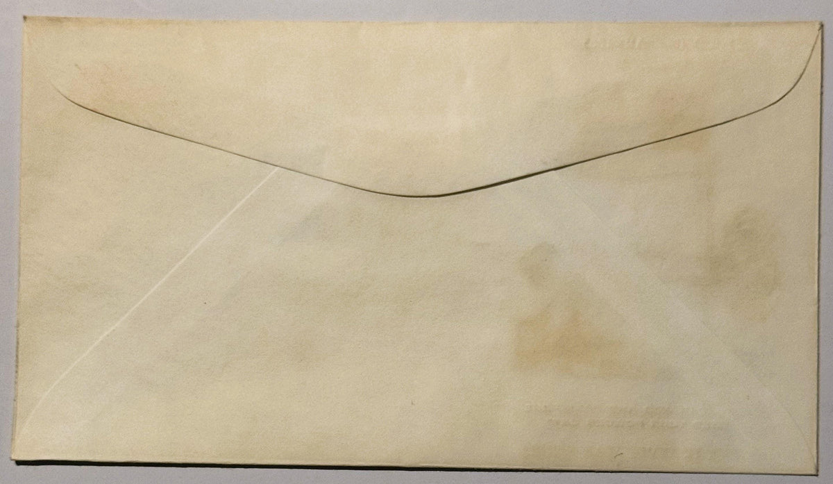 Cream-colored vintage envelope with curved flap closure and embossed diagonal lines, shown front-facing against neutral backg
