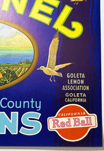 Vintage lemon crate label with purple background, yellow "Channel" text, flying bird, "Goleta Lemon Association Goleta Califo
