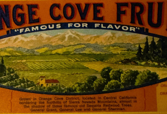 Vintage orange crate label with "Orange Cove Fruit" text, pastoral landscape showing mountains, farmland, and a small house w