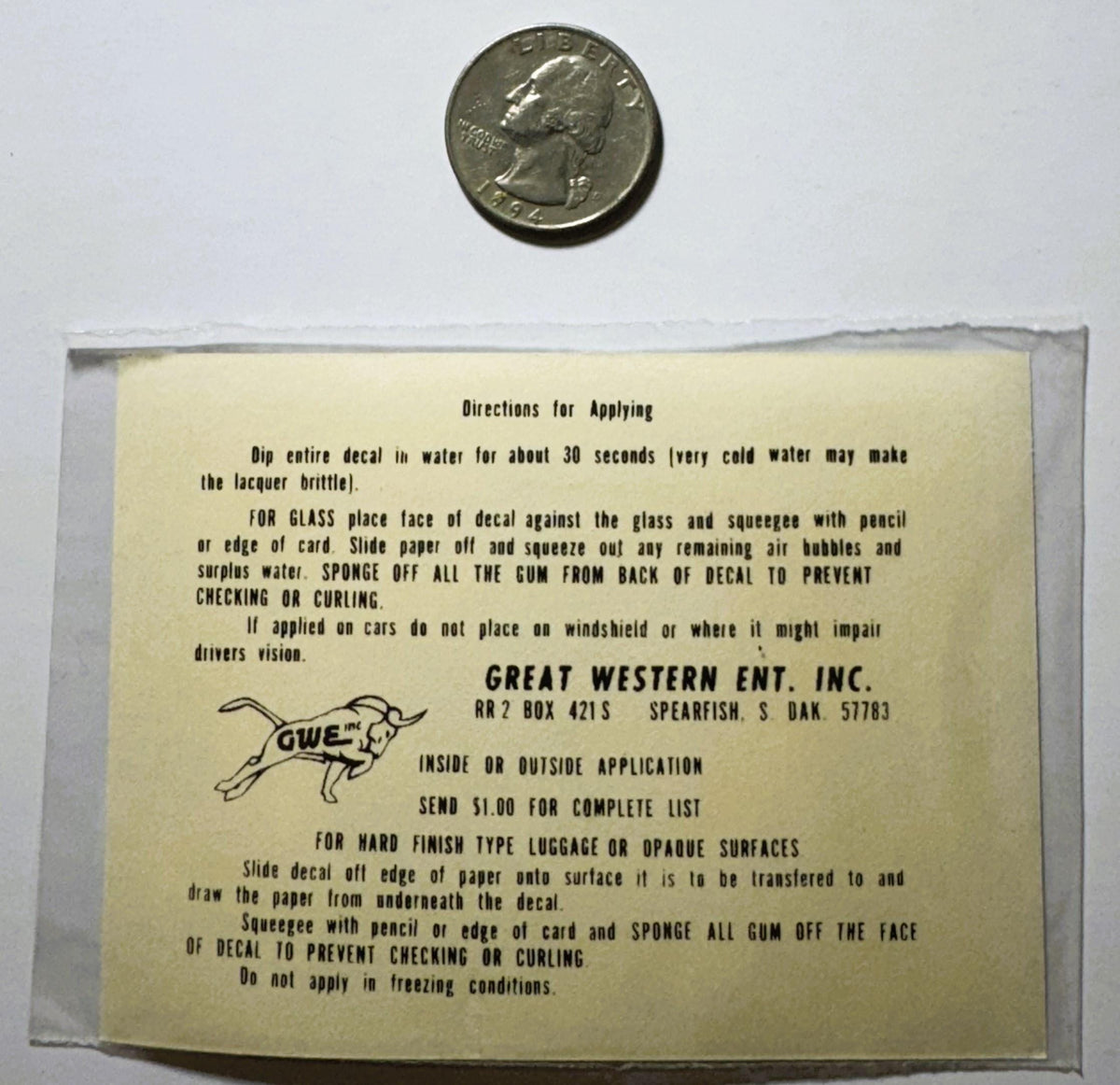 Vintage decal instruction sheet with quarter for scale, showing Great Western Enterprises application directions for glass an