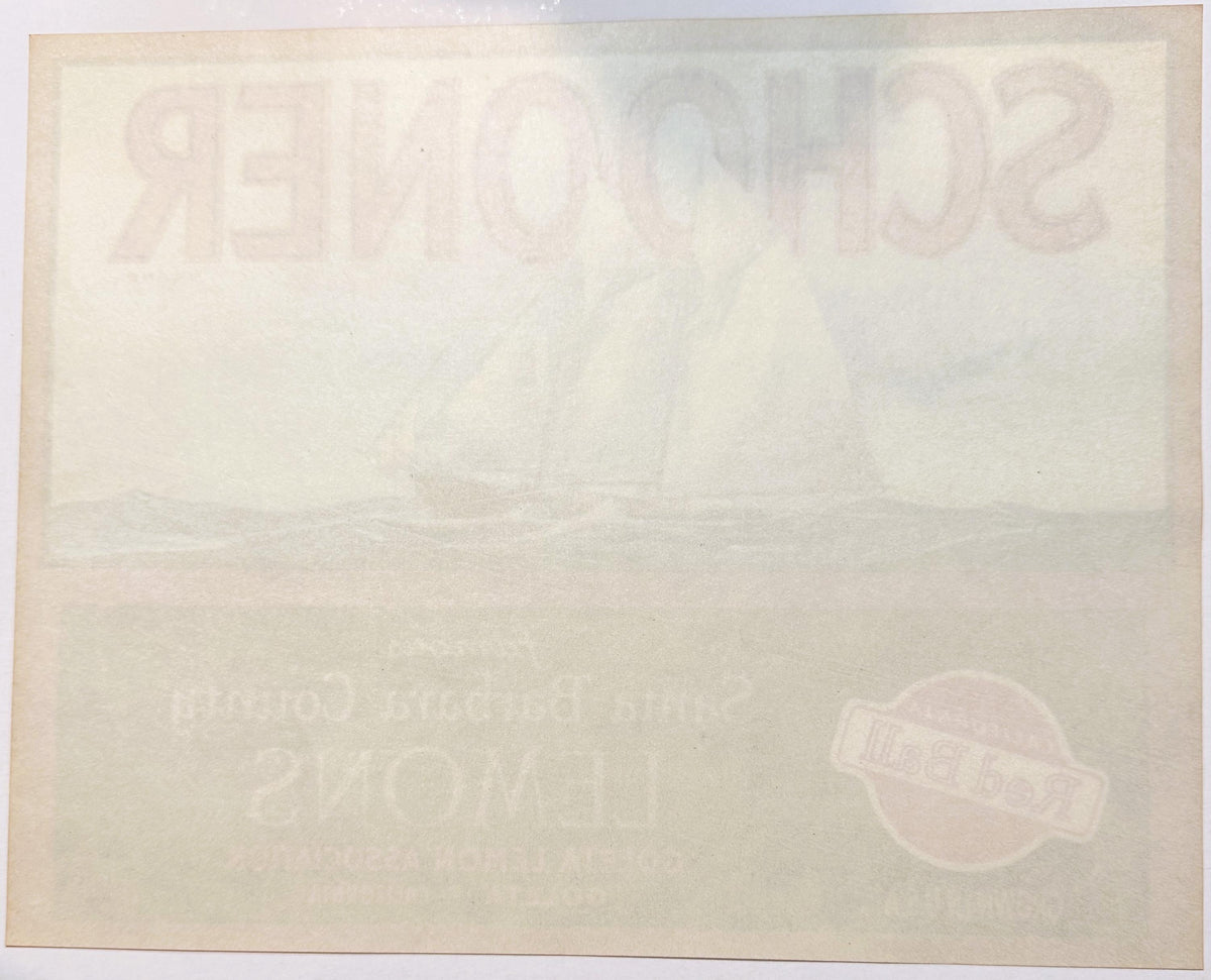Plain back of the Schooner lemon crate label with the front printing showing through in mirror image