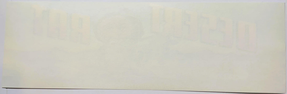Faded vintage fruit crate label with tan and cream coloring, showing partial text and graphics against a light background, ph
