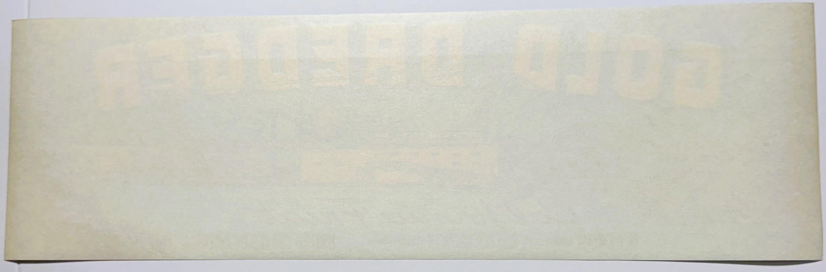 Blank cream-colored vintage fruit crate label, photographed flat against white background showing plain surface with subtle t