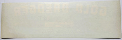 Blank cream-colored vintage fruit crate label, photographed flat against white background showing plain surface with subtle t