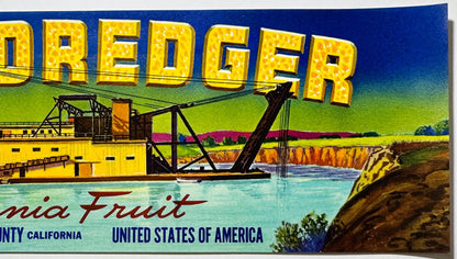 Vintage fruit crate label with yellow "DREDGER" text, steamboat on turquoise water, agricultural landscape, California and US