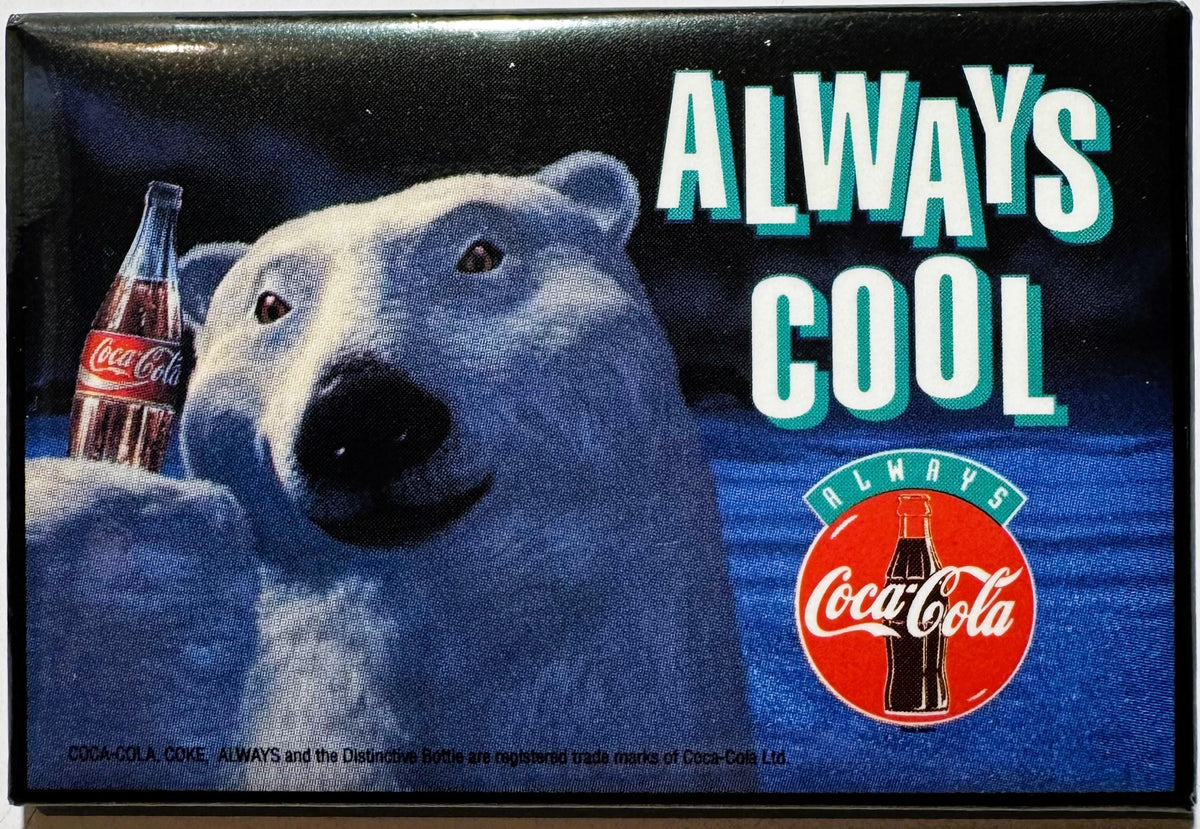 Vintage Coca-Cola advertising tin showing a polar bear with "Always Cool" text and classic bottle logo on dark blue backgroun