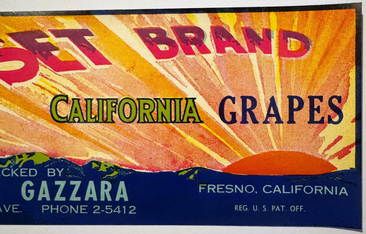 Vintage Sunset Brand California Grapes crate label with radiating sunburst design, packed by Gazzarra in Fresno, phone number