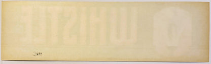 Vintage crate label with cream background and small brass steam whistle illustration in lower left corner, text reading "Whistle Brand" partially visible.