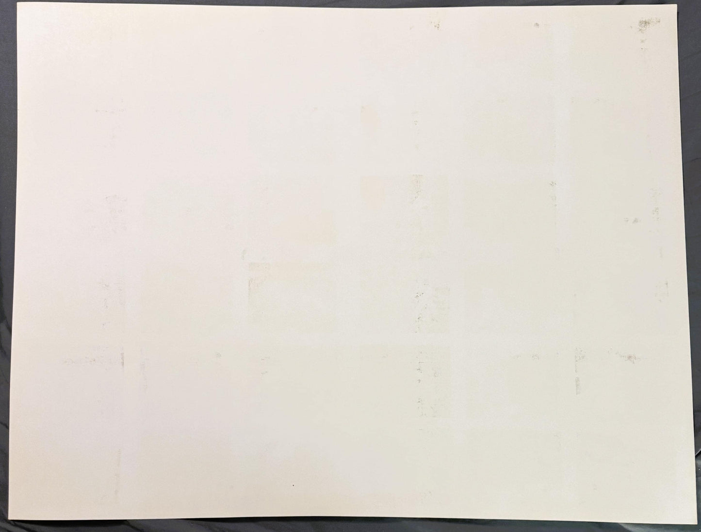 Blank, unprinted reverse of the Rini 1961 Yankees uncut press sheet, cream cardstock with faint show-through of the front art and minor handling specks