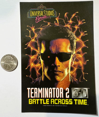Vintage 1996 Terminator 2: 3-D postcard from Universal Studios Florida with sunglasses-wearing face and lightning effects, sh
