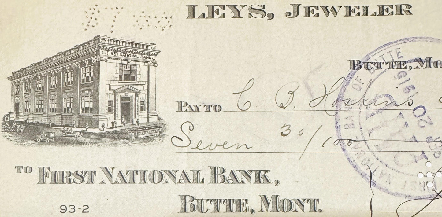 Antique bank check from Leys Jeweler in Butte, Montana, featuring First National Bank building illustration and handwritten a
