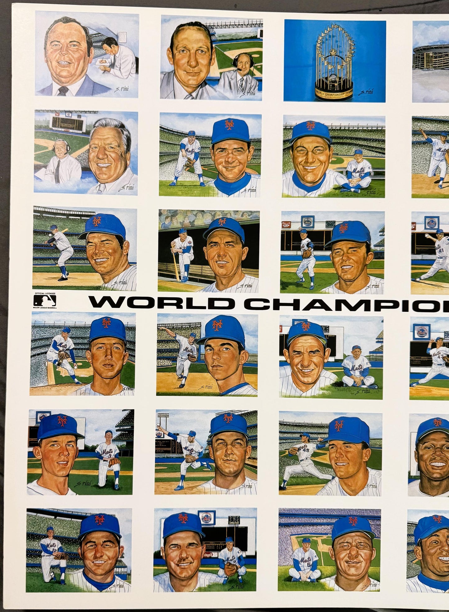 Angled view of the uncut Rini 1969 Mets sheet's left portion: painted player panels, broadcasters, and the trophy panel