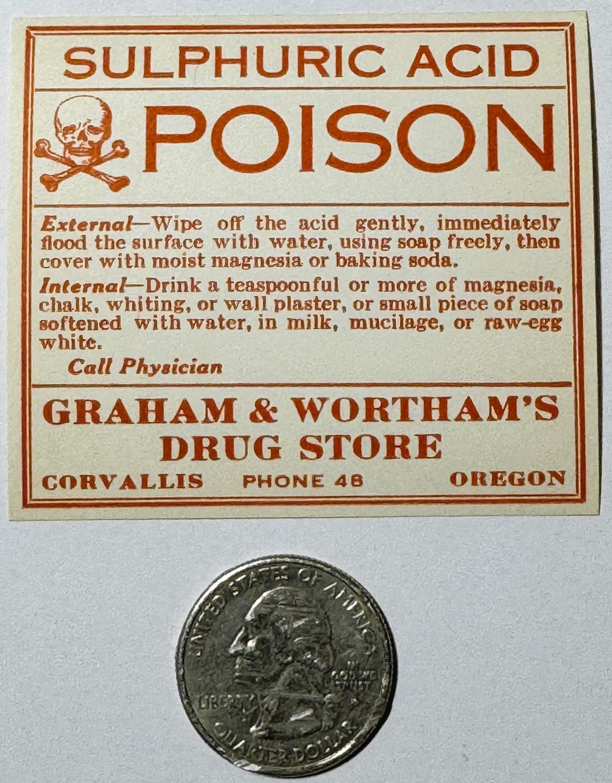 Vintage sulphuric acid poison label with skull and crossbones, treatment instructions, and Corvallis Oregon drug store detail