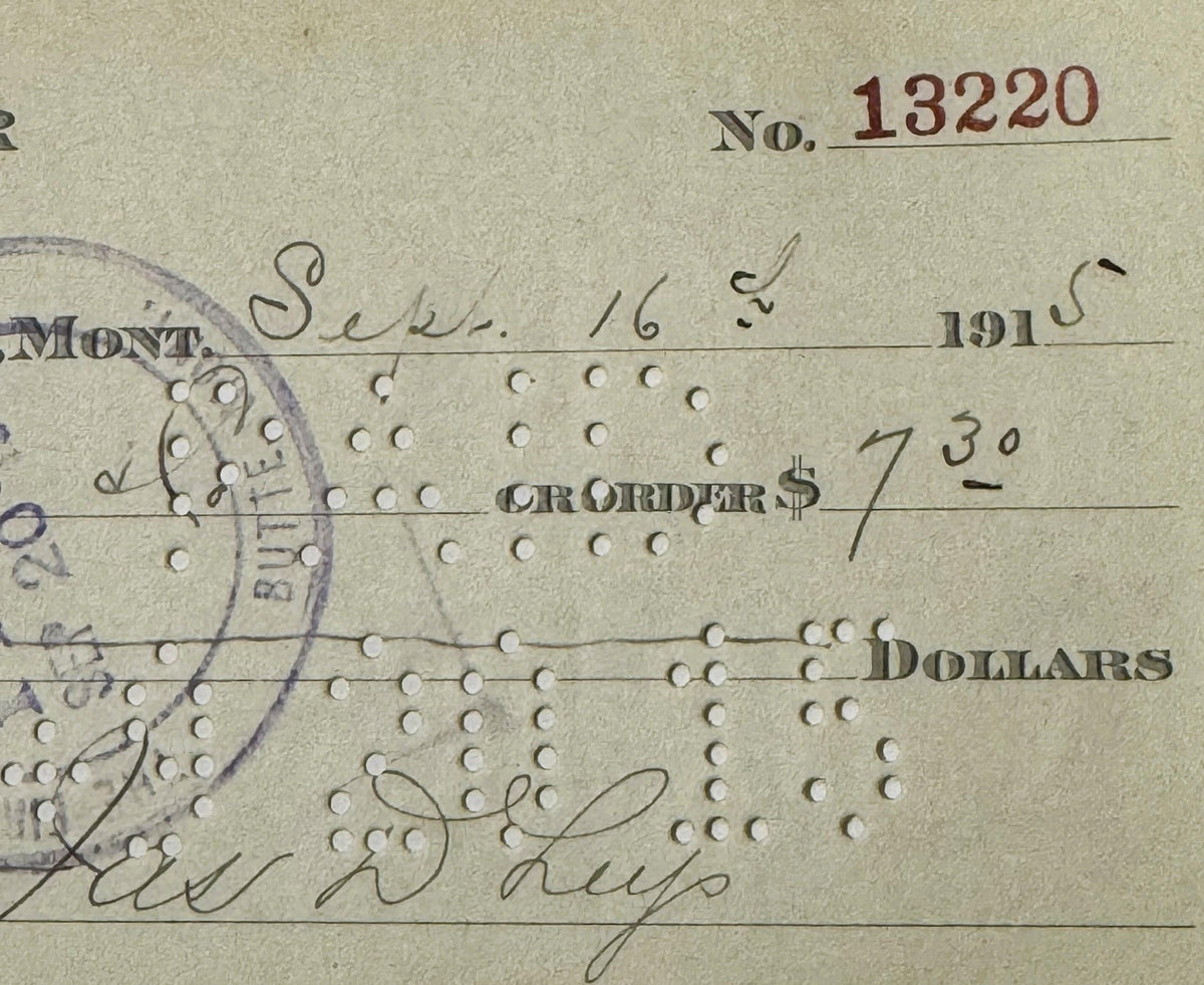 Vintage bank check from Leys Jeweler in Butte, Montana dated September 16, 1915 for $7.30, showing handwritten signature and 