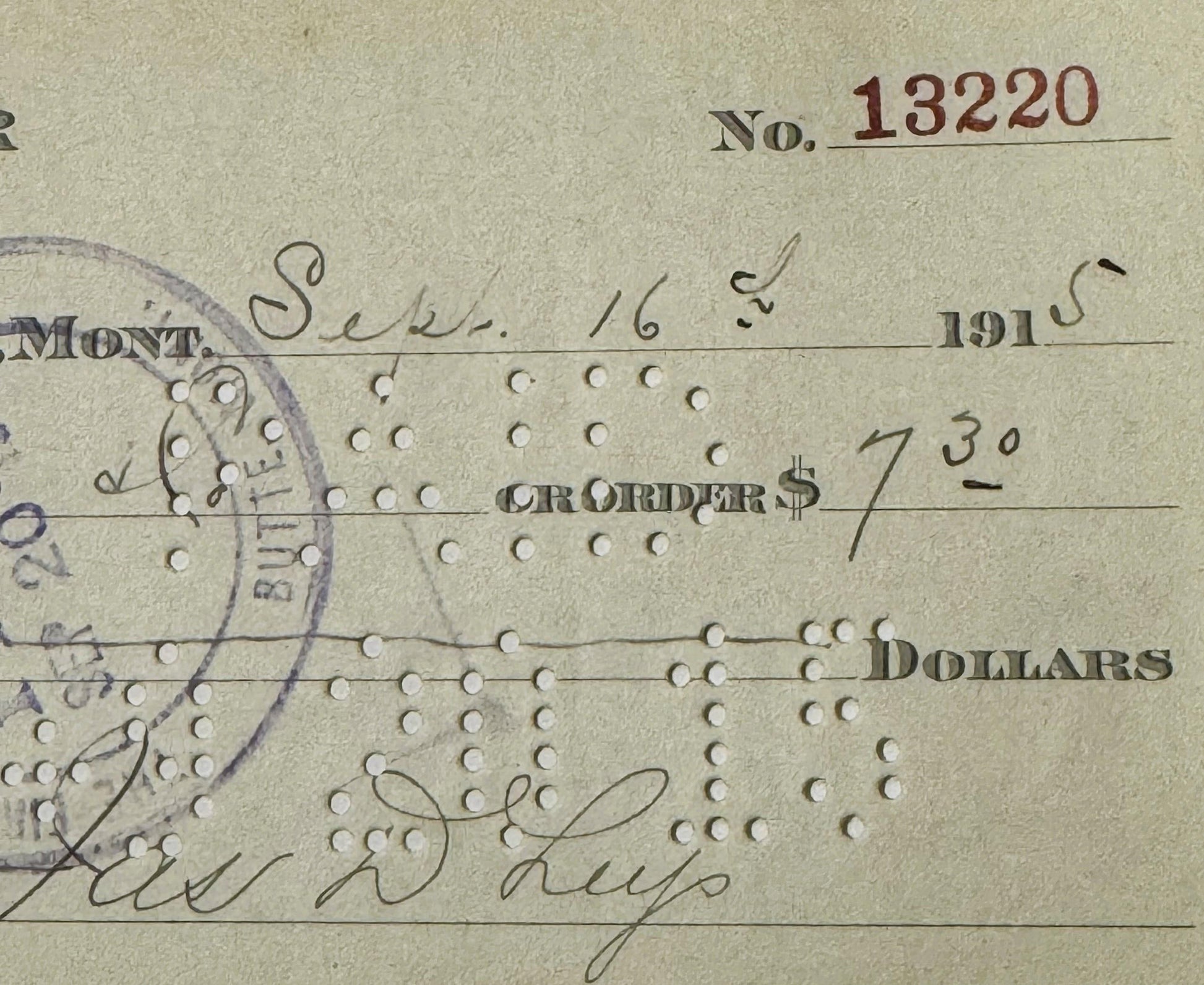 Vintage bank check from Leys Jeweler in Butte, Montana dated September 16, 1915 for $7.30, showing handwritten signature and 