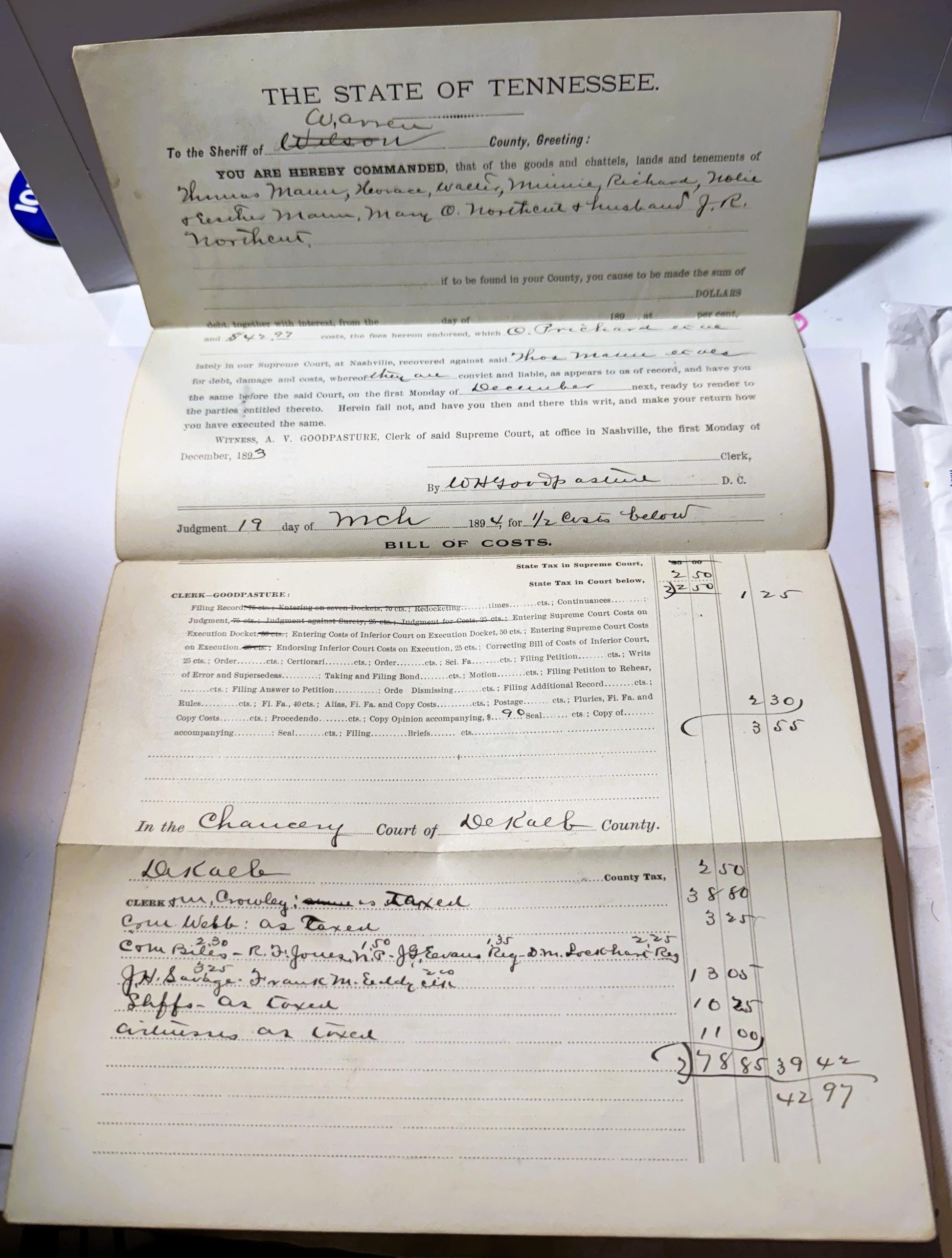 Aged cream-colored legal documents from 1893 Tennessee Supreme Court showing writ text, handwritten annotations, and bill of 