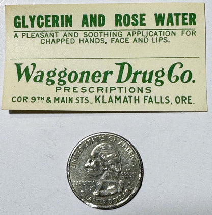 Vintage cream-colored label for glycerin and rose water from Waggoner Drug Co., Klamath Falls, Oregon, shown with a quarter c