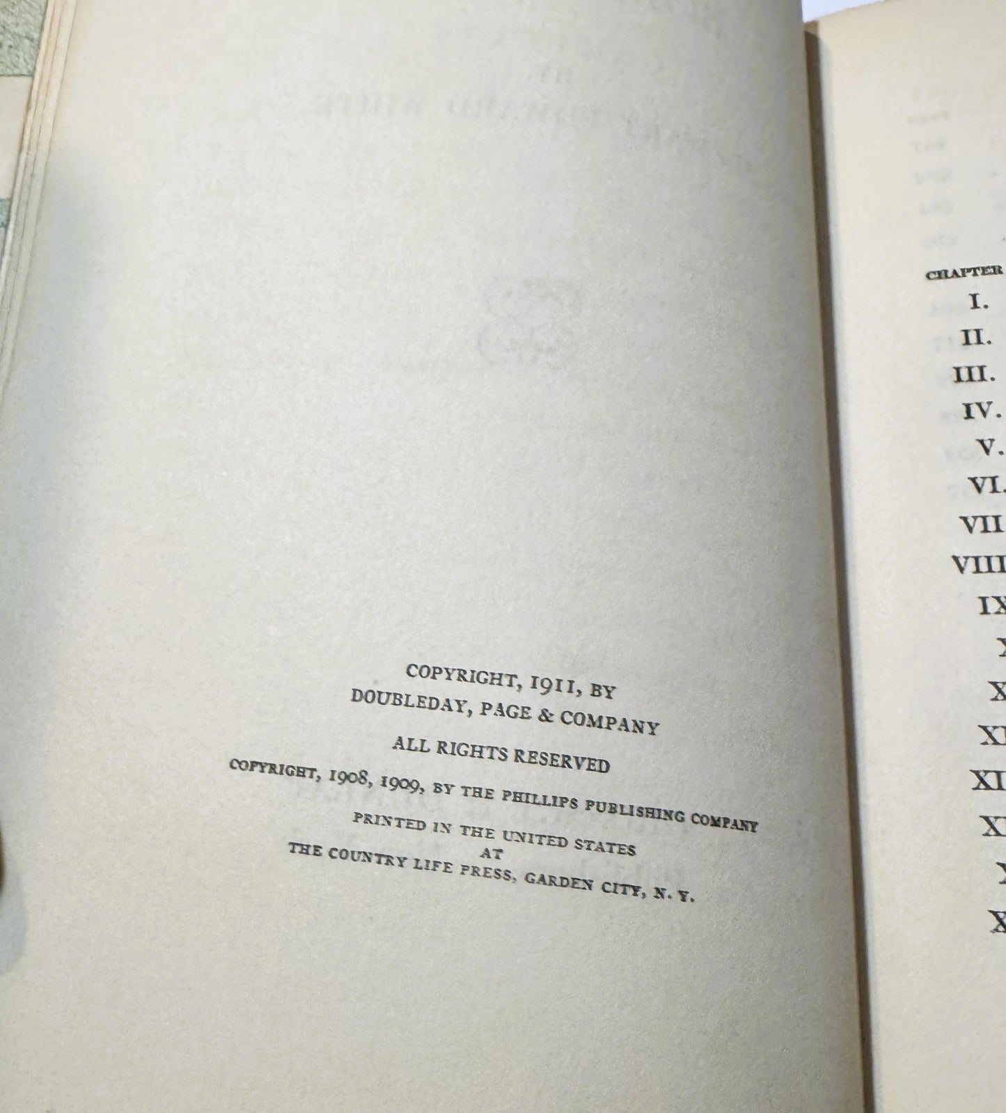 Open book pages showing copyright notice dated 1911 by Doubleday, Page & Company and table of contents with Roman numerals I-
