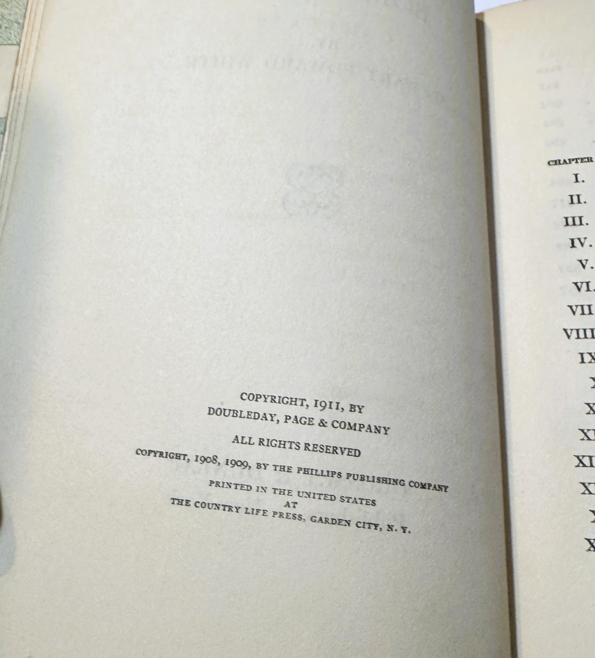 Open book pages showing copyright notice dated 1911 by Doubleday, Page & Company and table of contents with Roman numerals I-