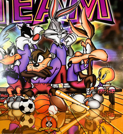 Colorful 1990s Looney Tunes poster featuring Bugs Bunny, Daffy Duck, Tasmanian Devil and other cartoon characters surrounded 