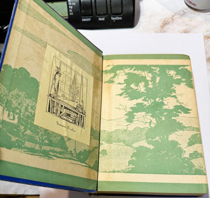 Open antique book with green and cream illustrated endpapers, showing an ex libris bookplate labeled "Sumner Porter" on left 