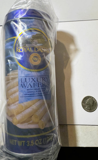 Royal Dansk Luxury Wafer package with vanilla cream flavor next to a quarter for scale on white background