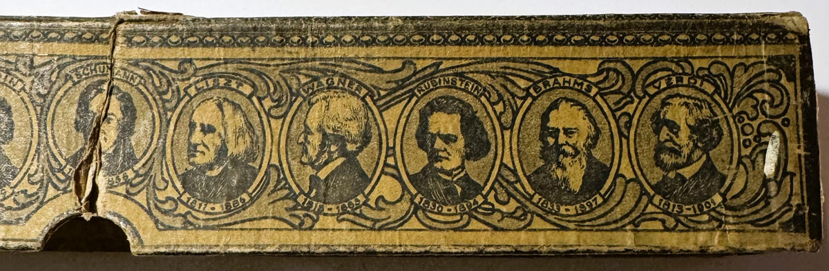 Ornate brass player piano roll header showing six portrait medallions of men in period dress with decorative scrollwork