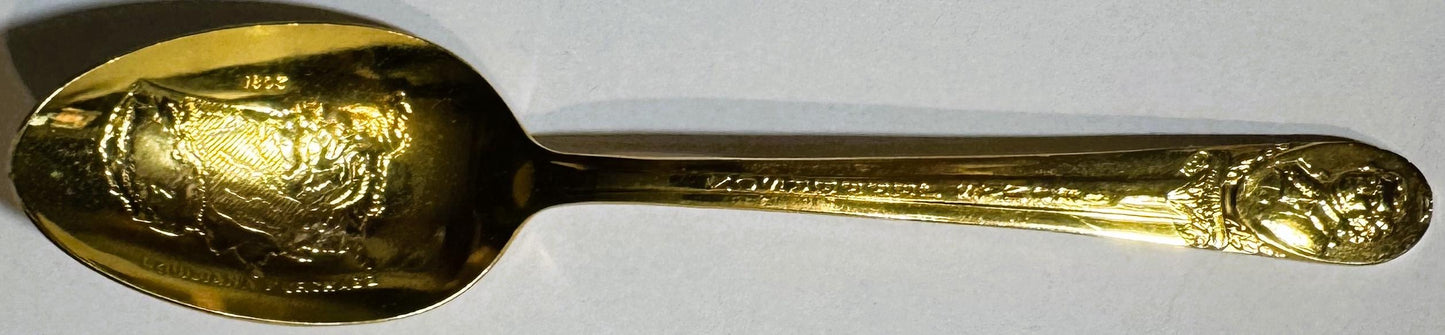 Close view of the Jefferson spoon bowl showing the gold-wash silverplate surface and relief detail.